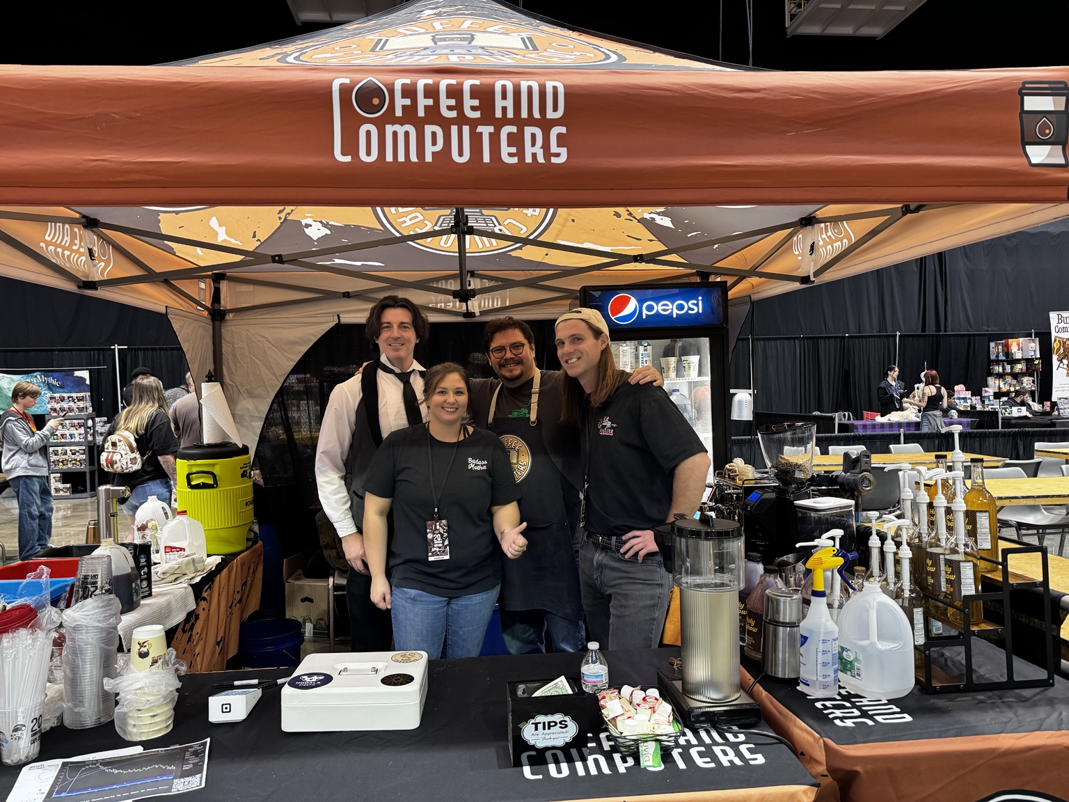 Coffee & Computers team under the convention tent